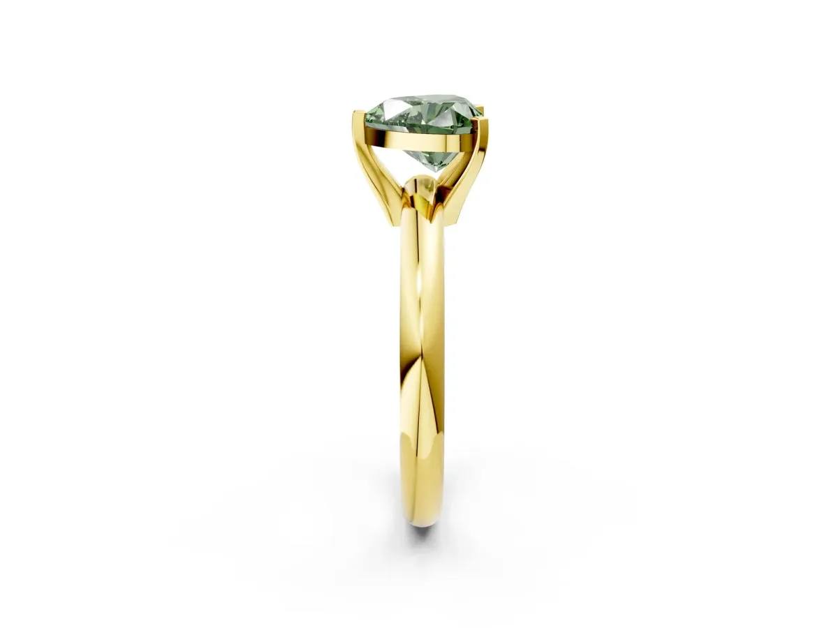 Fancy Green Heart Cut Diamond Solitaire Engagement Ring with Round Band and Four-Prong Setting Yellow gold