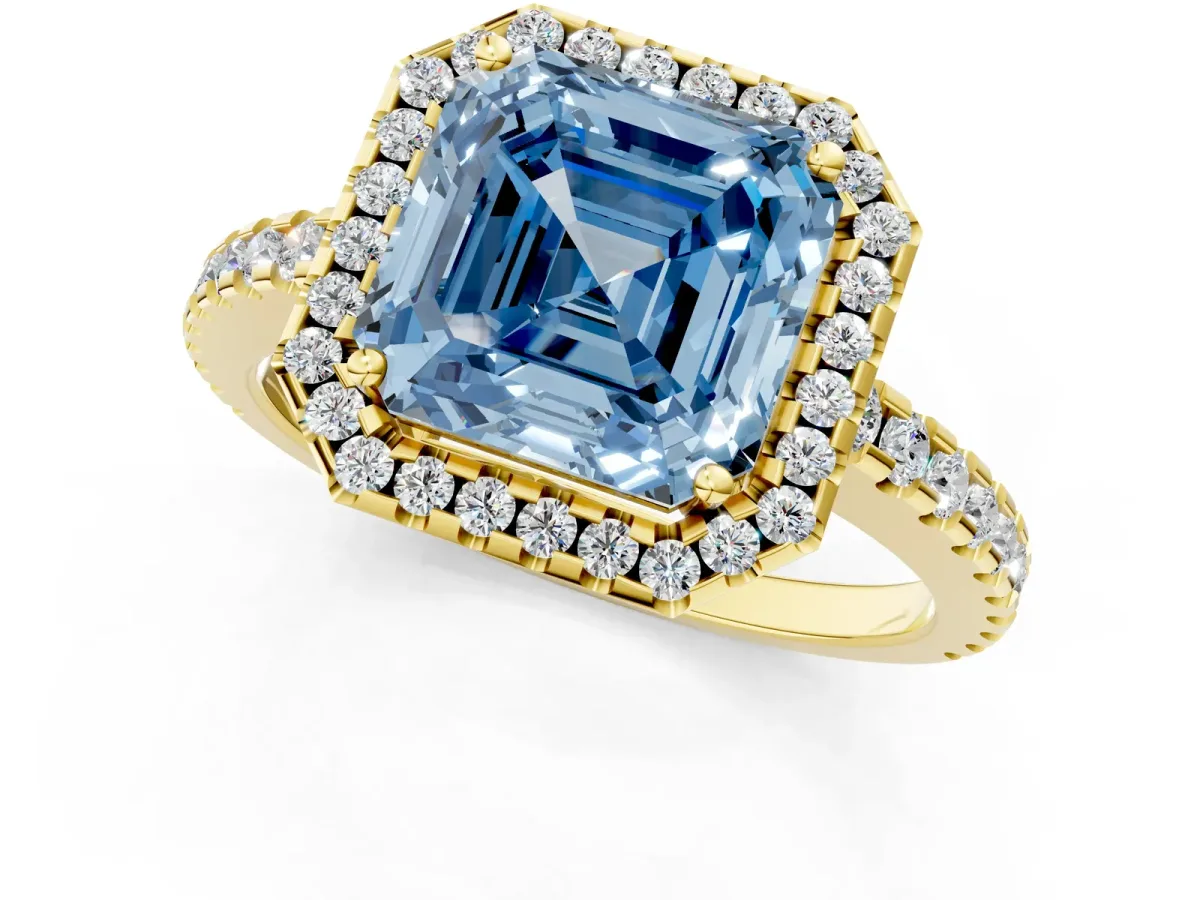 Fancy Blue Asscher Cut Diamond Halo Engagement Ring with Pavé Band and Prong Setting Yellow gold