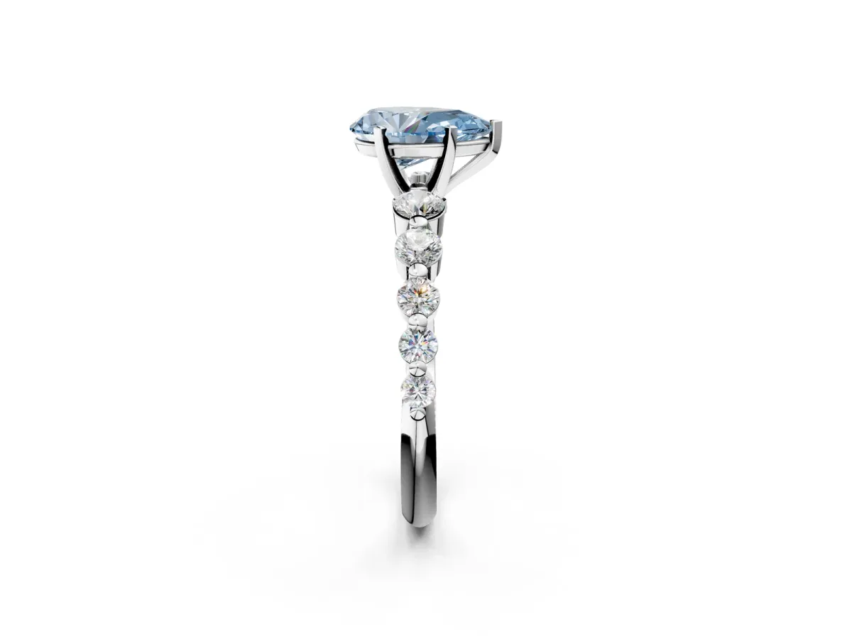 Fancy Blue Pear Cut Solitaire Diamond Ring with Pave Band and Four-Prong Setting Platinum