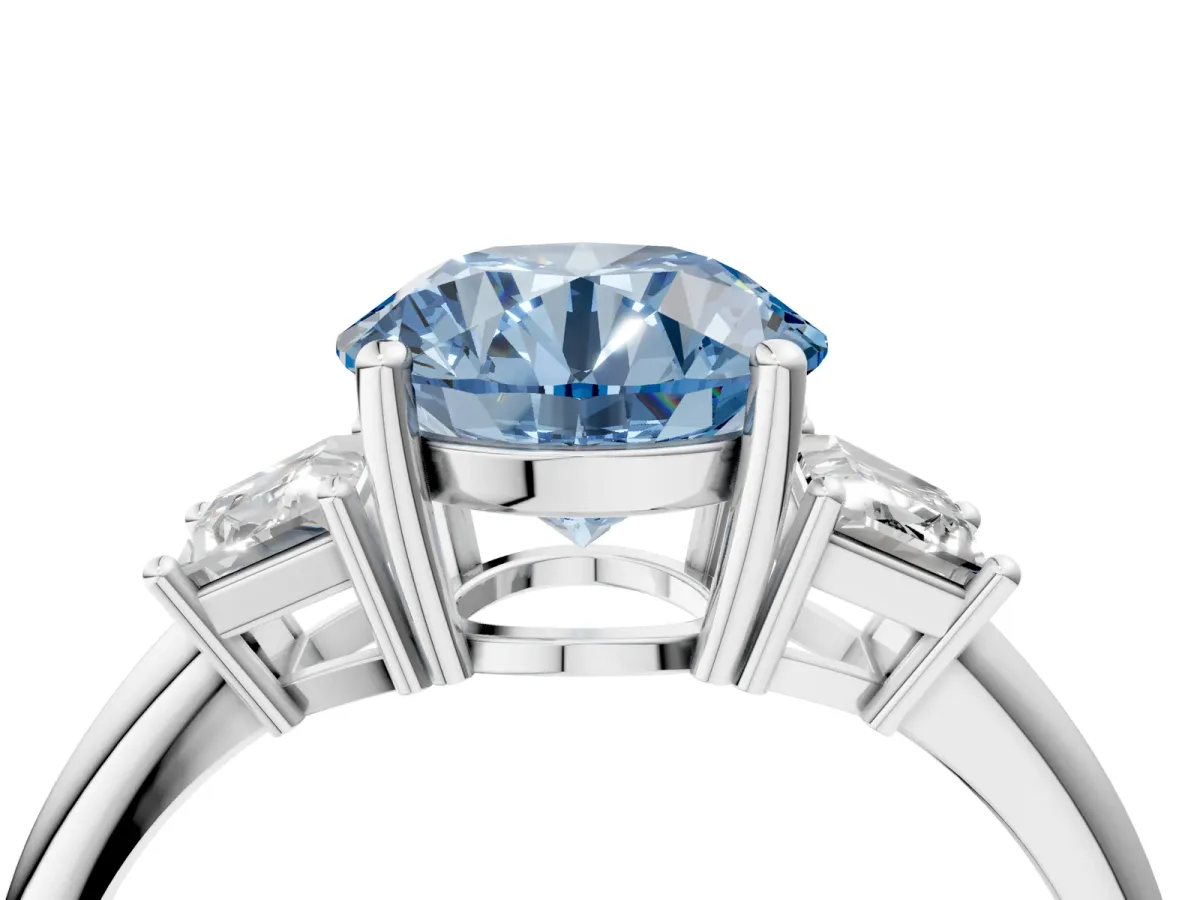 Fancy Blue Round Cut Diamond Three-Stone Ring with Trapezoid Side Stones and Prong Setting Platinum