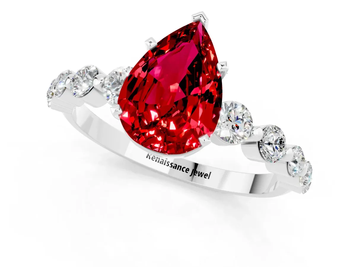 Pear Cut Solitaire Ruby Ring with Pave Band and Four-Prong Setting White gold