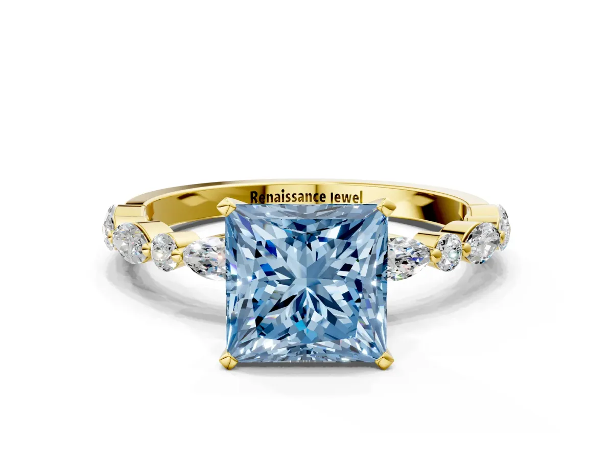 Fancy Blue Princess Cut Diamond Ring with Marquise and Round Side Stones and Four-Prong Setting Yellow gold