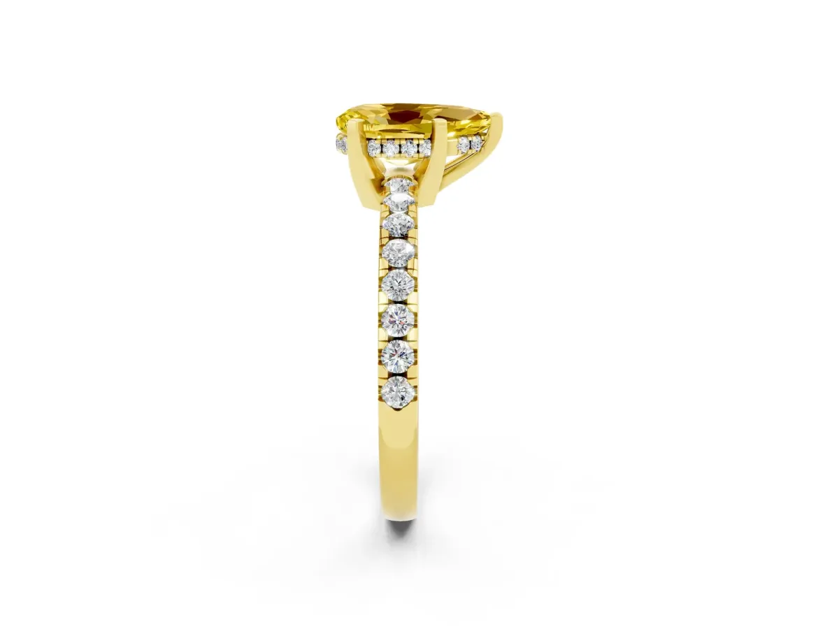 Pear Cut Yellow Sapphire Solitaire Ring with Round Pavé Band and Four-Prong Setting Yellow gold