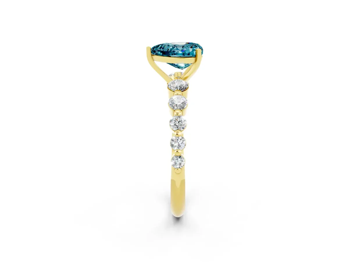 Heart Cut Solitaire Blue Topaz Ring with Pave Band and Four-Prong Setting Yellow gold