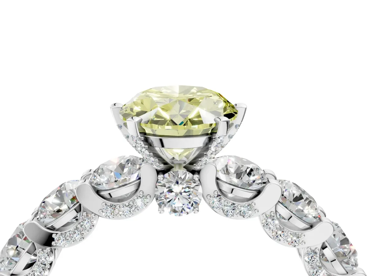 Fancy Yellow Oval Cut Diamond Side Stone Engagement Ring with Four-Prong Setting Platinum