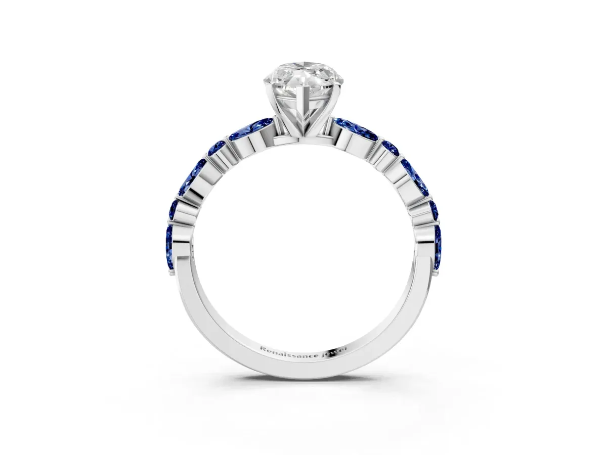 Marquise Cut Diamond Ring with Marquise and Round Blue Sapphire Side Stones and Four-Prong Setting Platinum