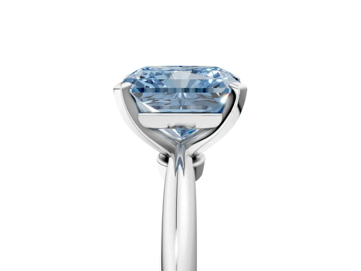 Fancy Blue Radiant Cut Diamond Solitaire Ring with Six-Prong Setting and Classic Band Silver