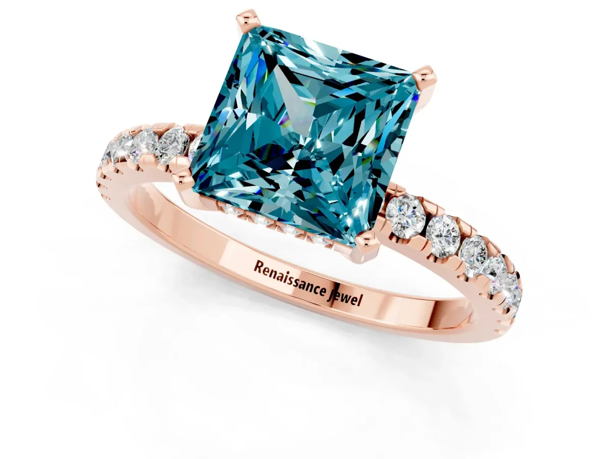 Princess Cut Blue Topaz Solitaire Ring with Round Pavé Band and Four-Prong Setting Rose gold