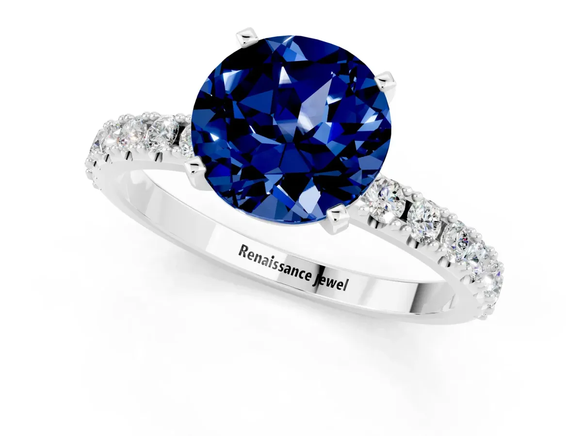 Round Cut Blue Sapphire Solitaire Pavé Band with Four-Prong Setting Silver