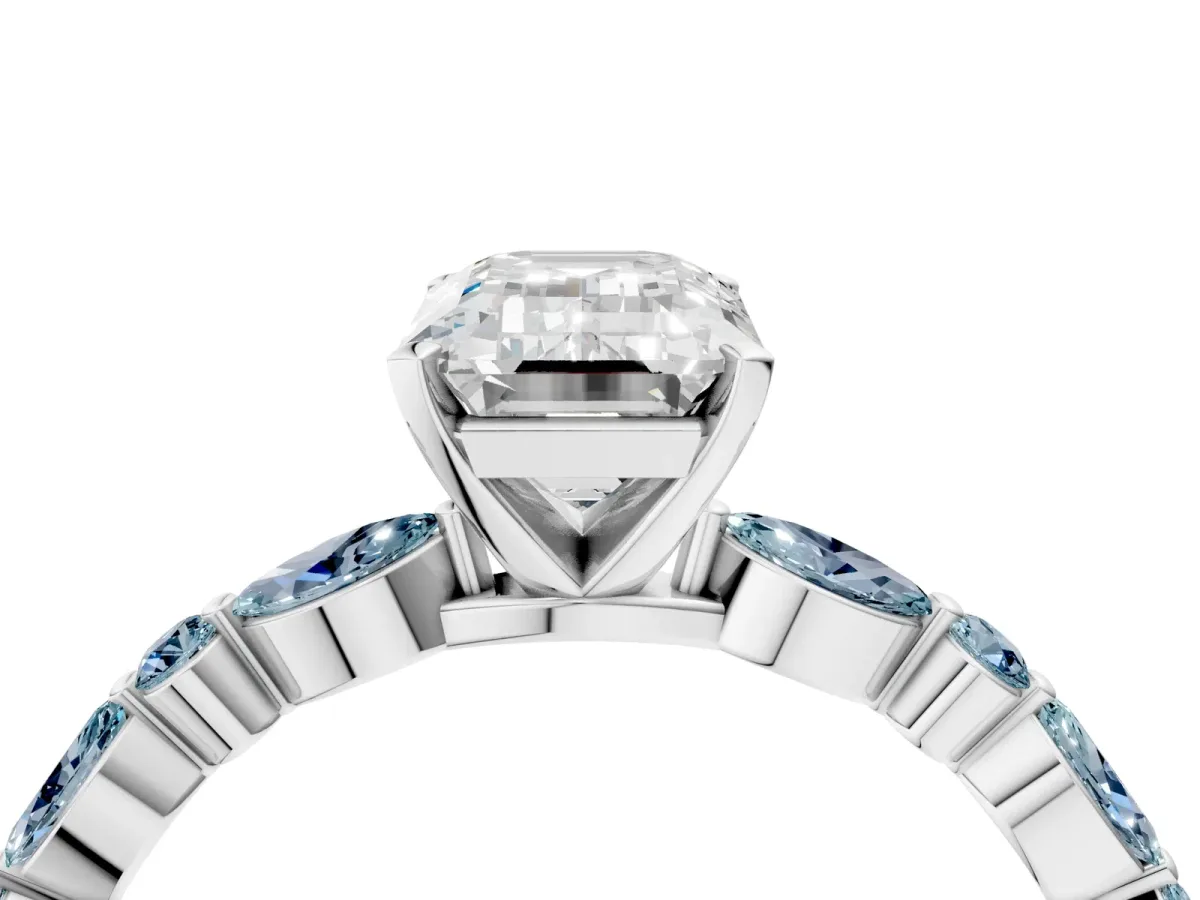 Emerald Cut Diamond Ring with Marquise and Round Aquamarine Side Stones and Four-Prong Setting White gold