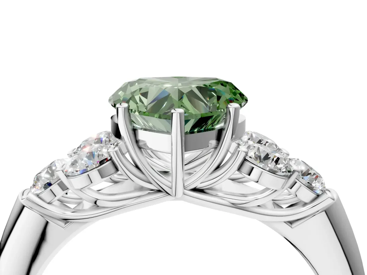 Fancy Green Heart Cut Cut Diamond Cluster Ring with Round Accent Stones and Prong Setting on a Classic Band Platinum