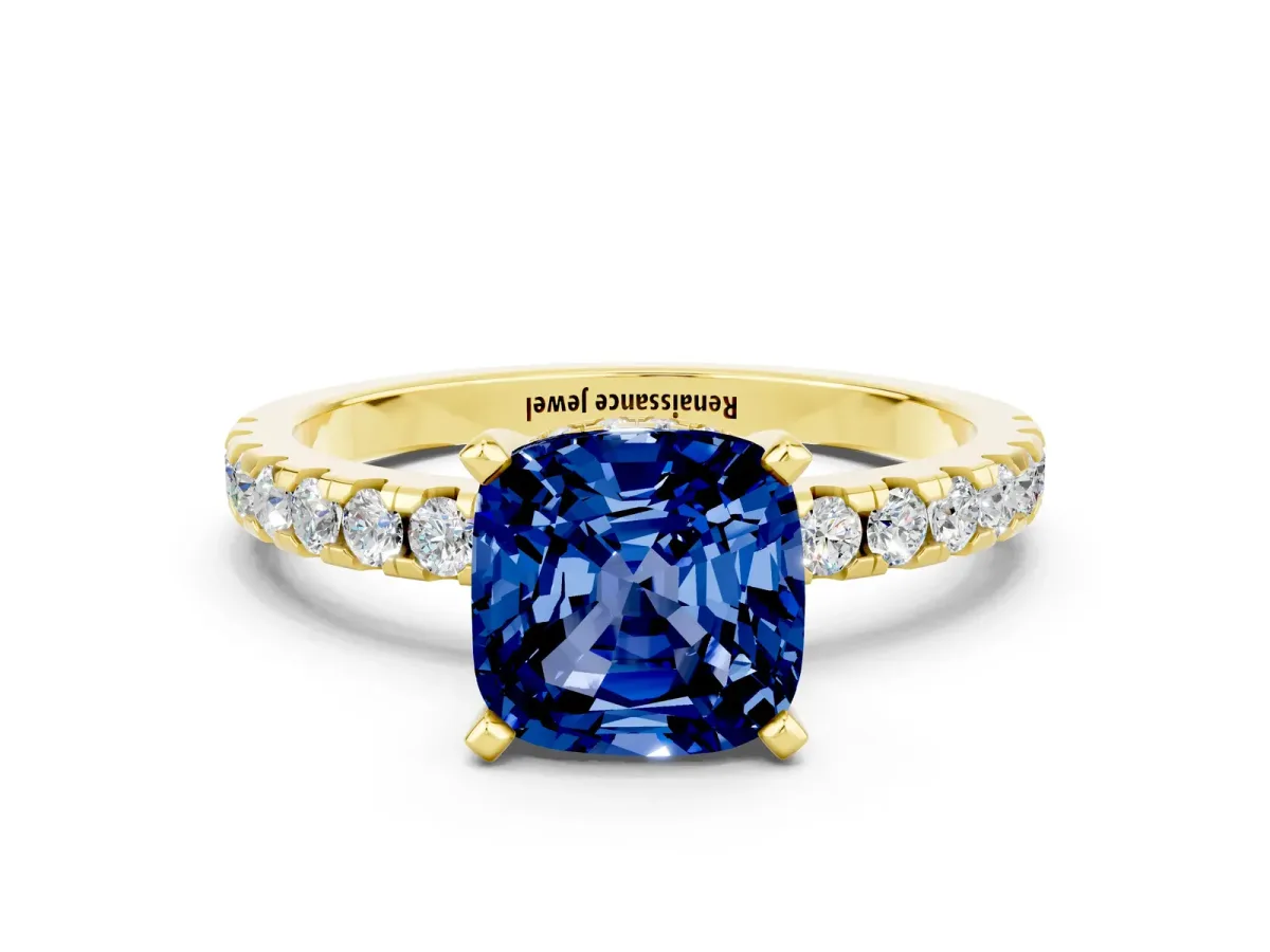 Cushion Cut Blue Sapphire Solitaire Ring with Round Pavé Band and Four-Prong Setting Yellow gold