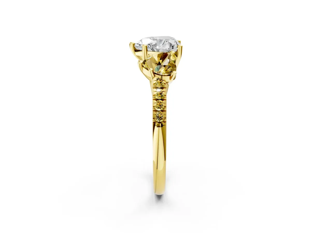 Three-Stone Heart Cut Diamond Ring with Round Yellow Sapphire Pavé Band and Prong Setting Yellow gold
