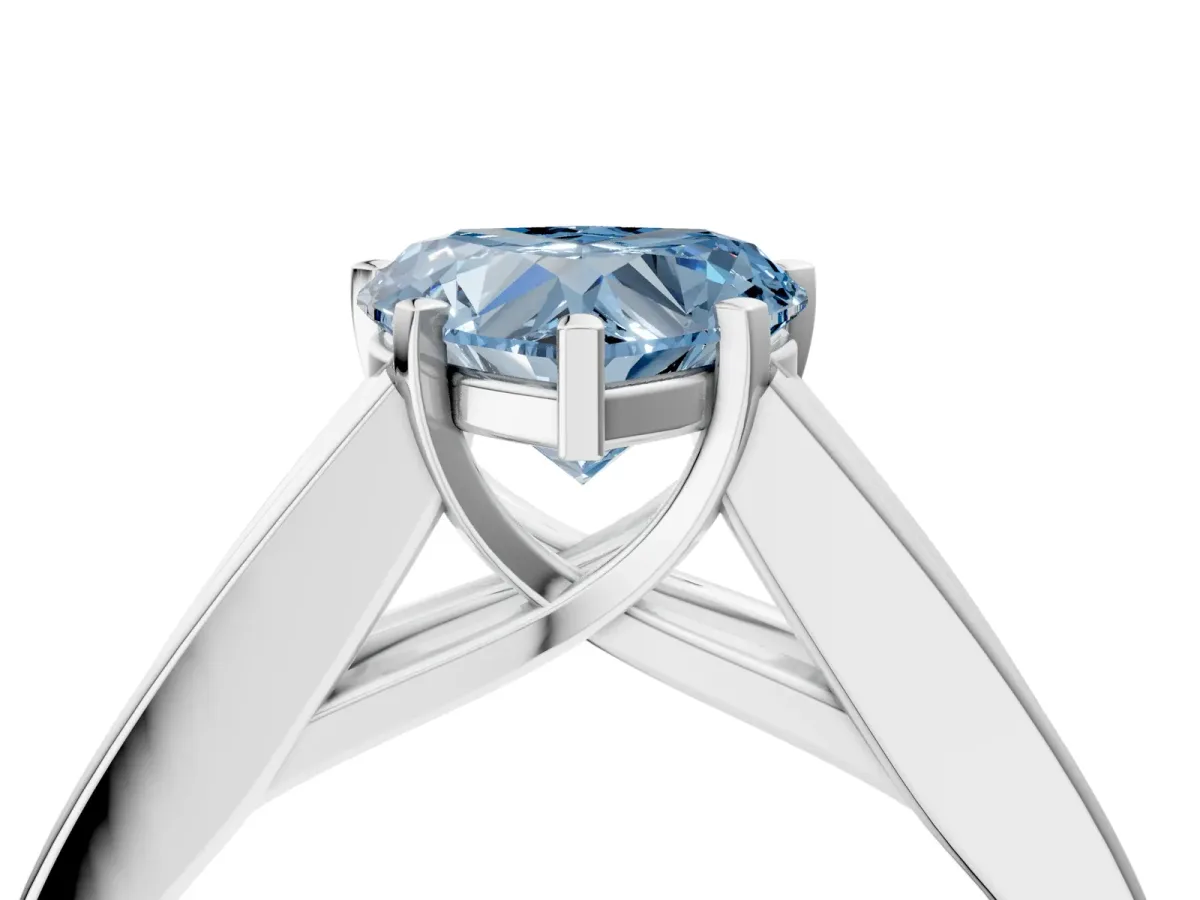 Fancy Blue Heart Cut Cut Channel Set Solitaire Ring with Four-Prong Setting Silver
