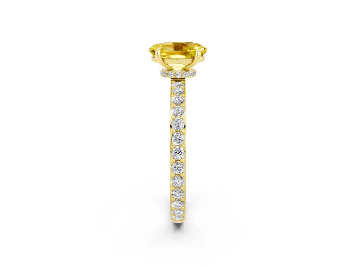Oval Cut Yellow Sapphire Solitaire Engagement Ring with Pavé Band and Four-Prong Setting Yellow gold