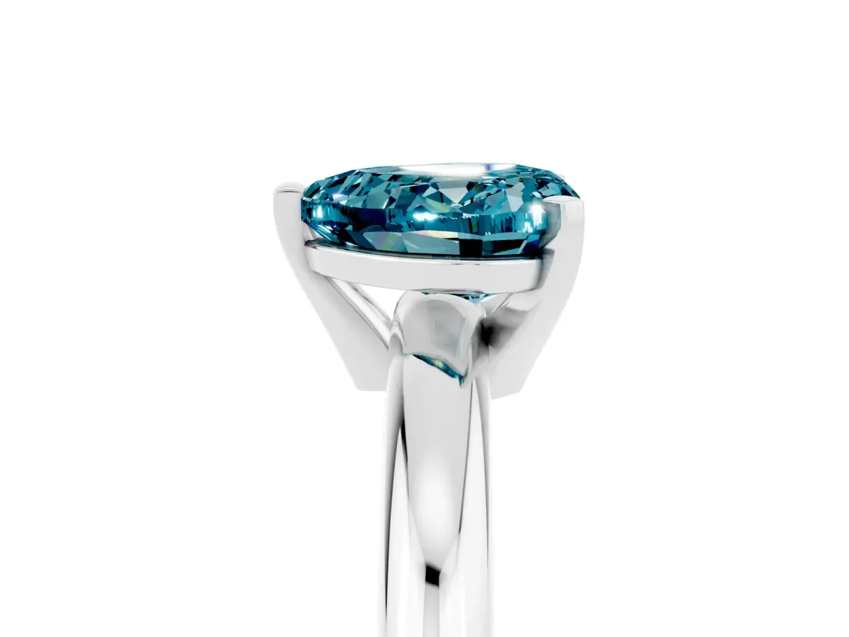 Heart Cut Blue Topaz Solitaire Engagement Ring with Round Band and Four-Prong Setting White gold