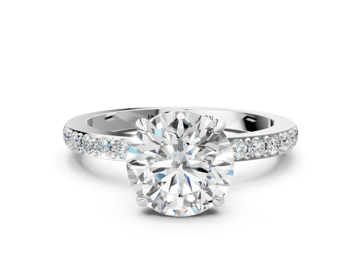 Round Cut Diamond Pavé Engagement Ring with Round Tanzanite Accents and Prong Setting White gold