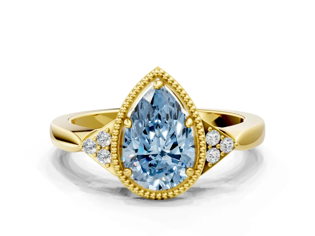 Fancy Blue Milgrain Pear Cut Cut Diamond Ring with Tapered Pave Band and Four Prong Setting Yellow gold