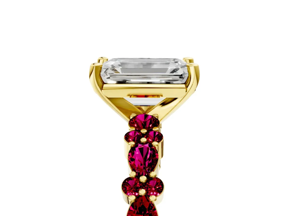 Emerald Cut Diamond Side Stone Solitaire Ring with Round Garnet and Four-Prong Setting Yellow gold