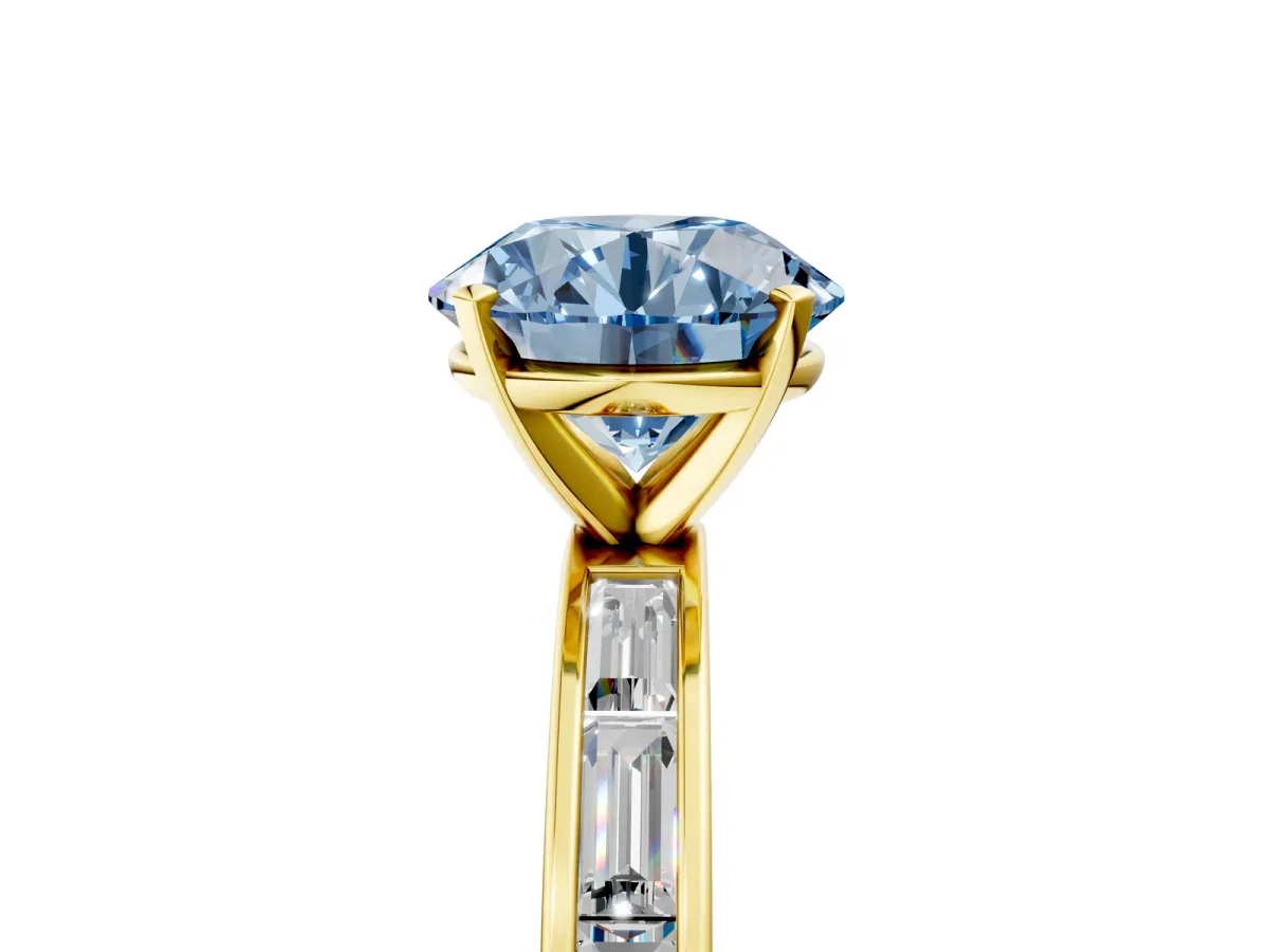 Fancy Blue Round Cut Solitaire Diamond Ring with Channel-Set Baguette Band and Four-Prong Setting Yellow gold