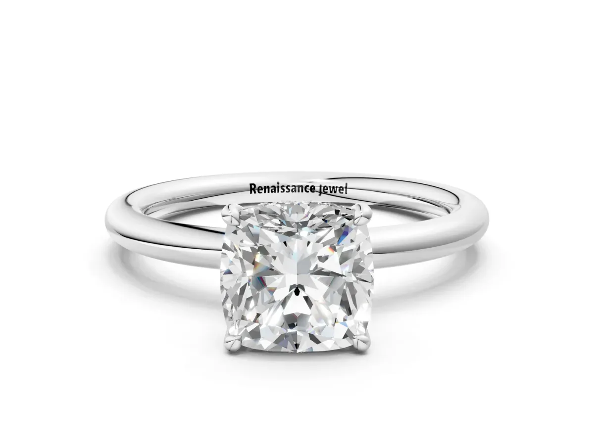 Cushion Cut Diamond Solitaire Ring with Thin Band and Four-Prong Setting White gold