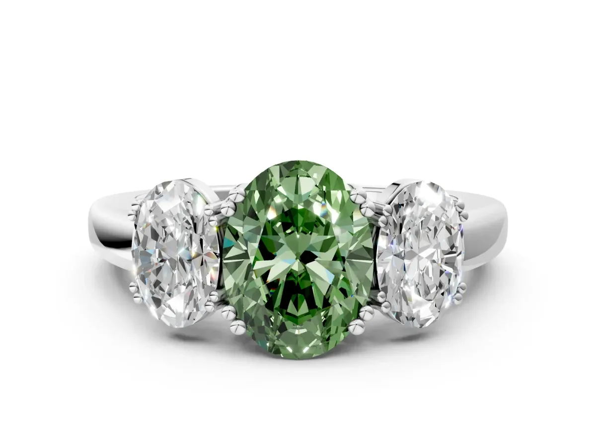 Fancy Green Three-Stone Oval Cut Cut Diamond Ring with Channel Set Band and Four-Prong Setting Silver