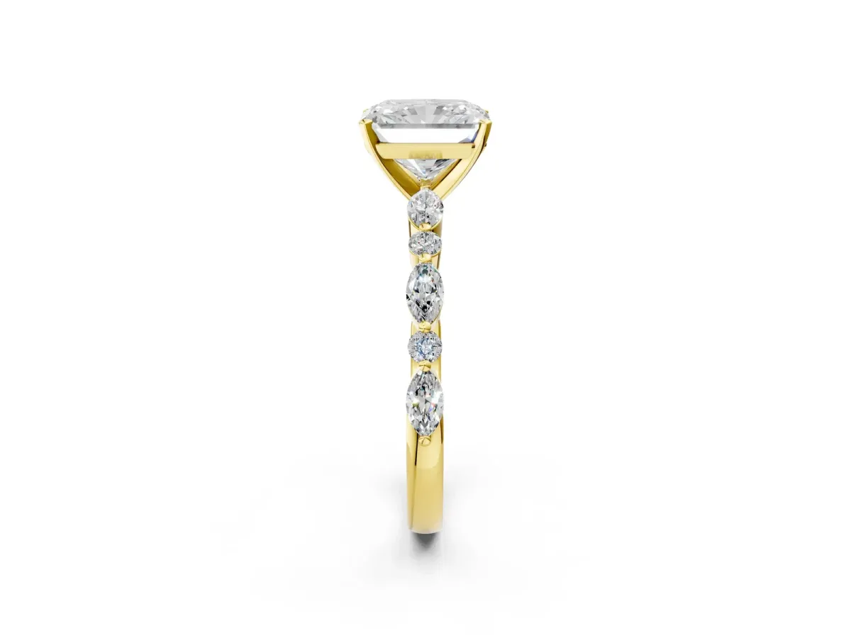 Radiant Cut Diamond Ring with Marquise and Round Side Stones and Four-Prong Setting Yellow gold