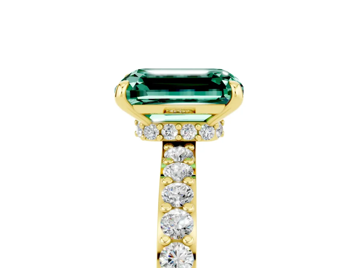 Emerald Cut Green Sapphire Solitaire Engagement Ring with Pavé Band and Four-Prong Setting Yellow gold