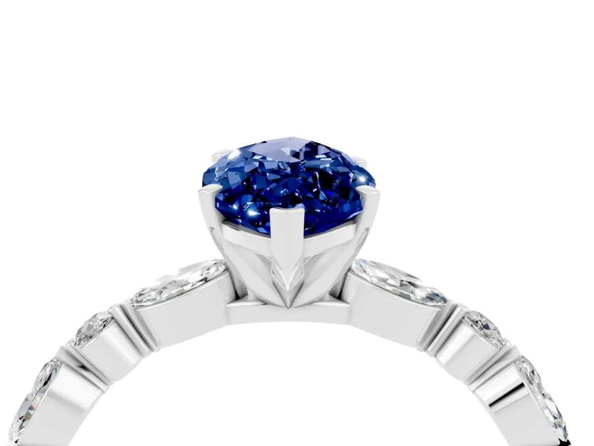Marquise Cut Blue Sapphire Ring with Marquise and Round Side Stones and Four-Prong Setting White gold