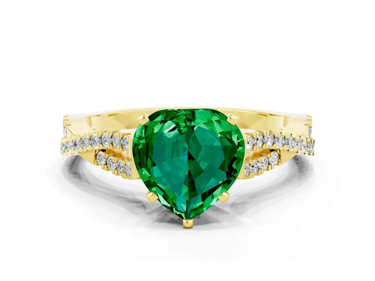 Heart Cut Emerald Solitaire Engagement Ring with Twisted Pavé Band and Four-Prong Setting Yellow gold
