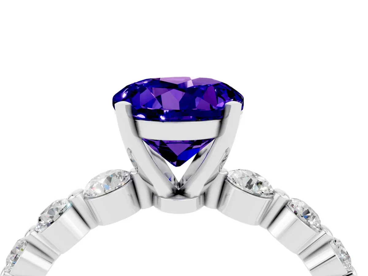 Round Cut Solitaire Tanzanite Ring with Pave Band and Four-Prong Setting Silver