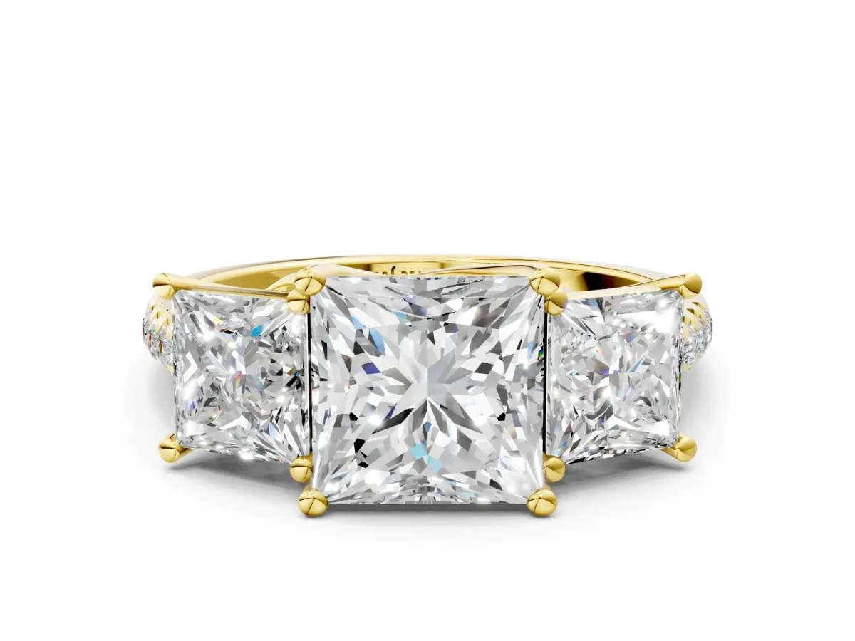 Three-Stone Princess Cut Diamond Ring with Round Moissanite Pavé Band and Prong Setting Yellow gold