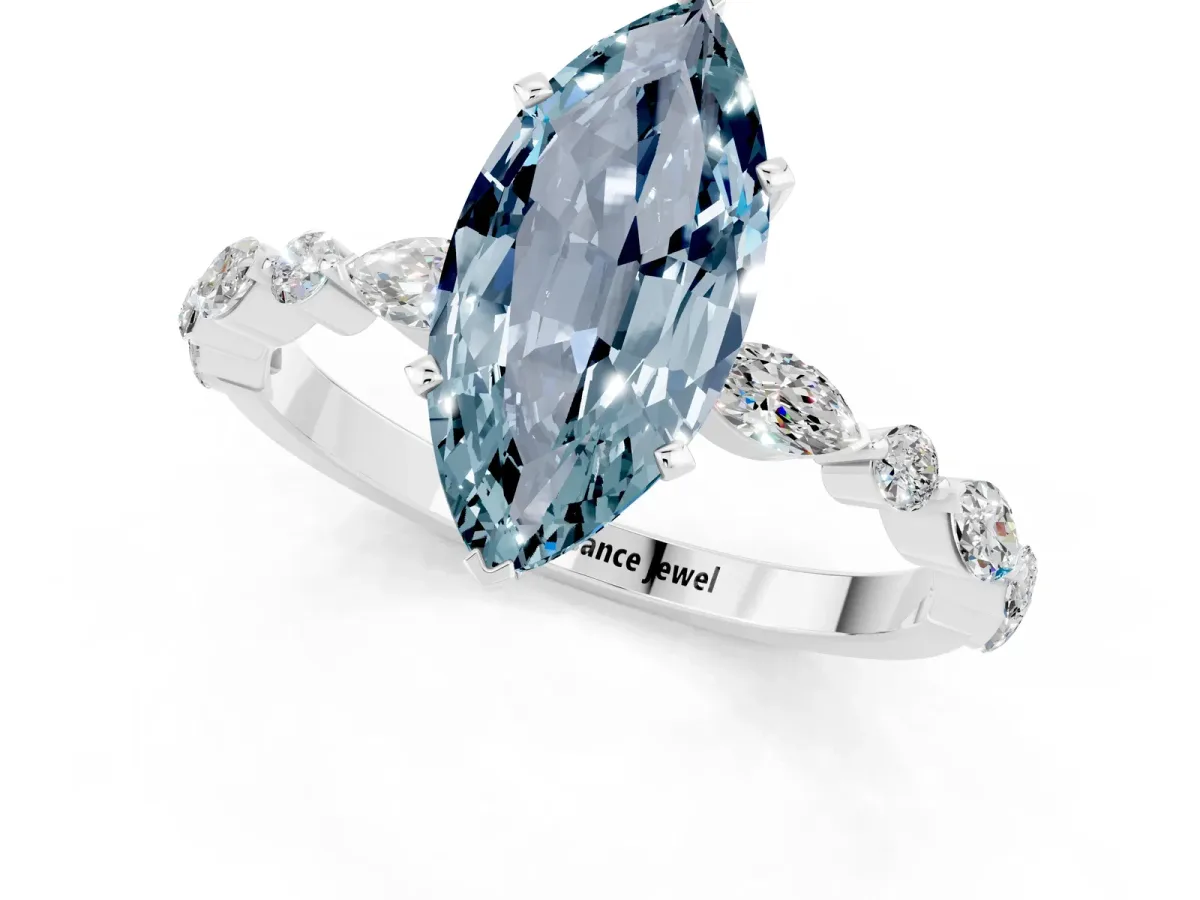 Marquise Cut Aquamarine Ring with Marquise and Round Side Stones and Four-Prong Setting Platinum