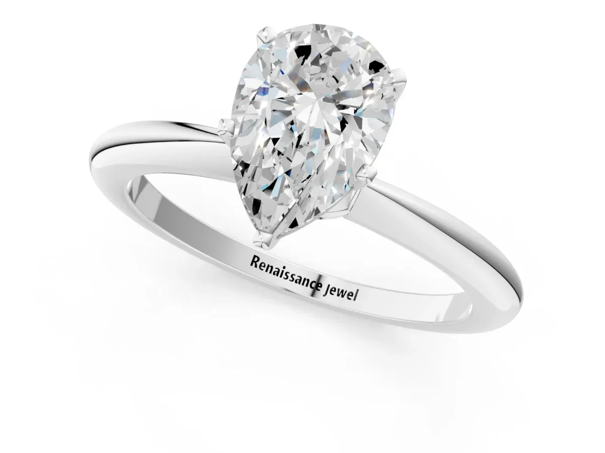 Pear Cut Diamond Solitaire Ring with Six-Prong Setting and Classic Band Platinum