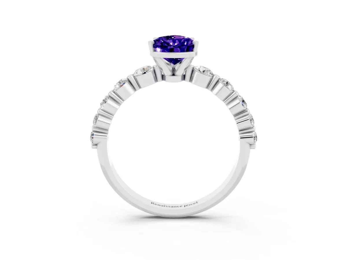 Pear Cut Solitaire Tanzanite Ring with Pave Band and Four-Prong Setting Silver
