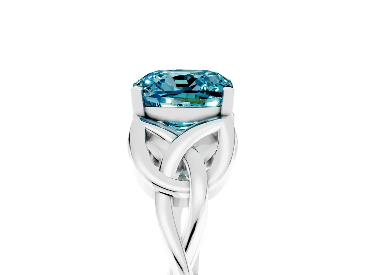 Cushion Cut Blue Topaz Solitaire Engagement Ring with Celtic Knot Band and Four-Prong Setting White gold