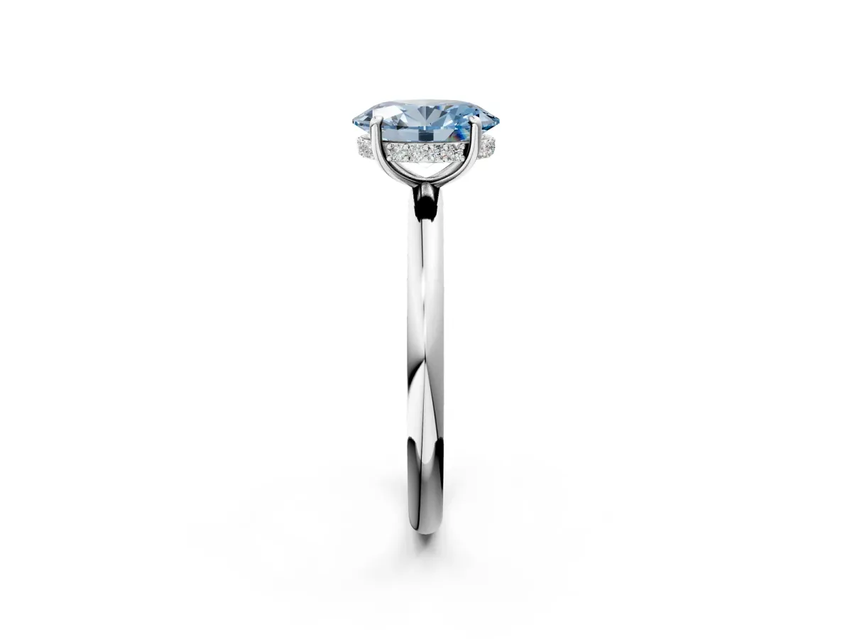 Fancy Blue Oval Cut Diamond Solitaire Ring with Thin Band and Four-Prong Setting White gold