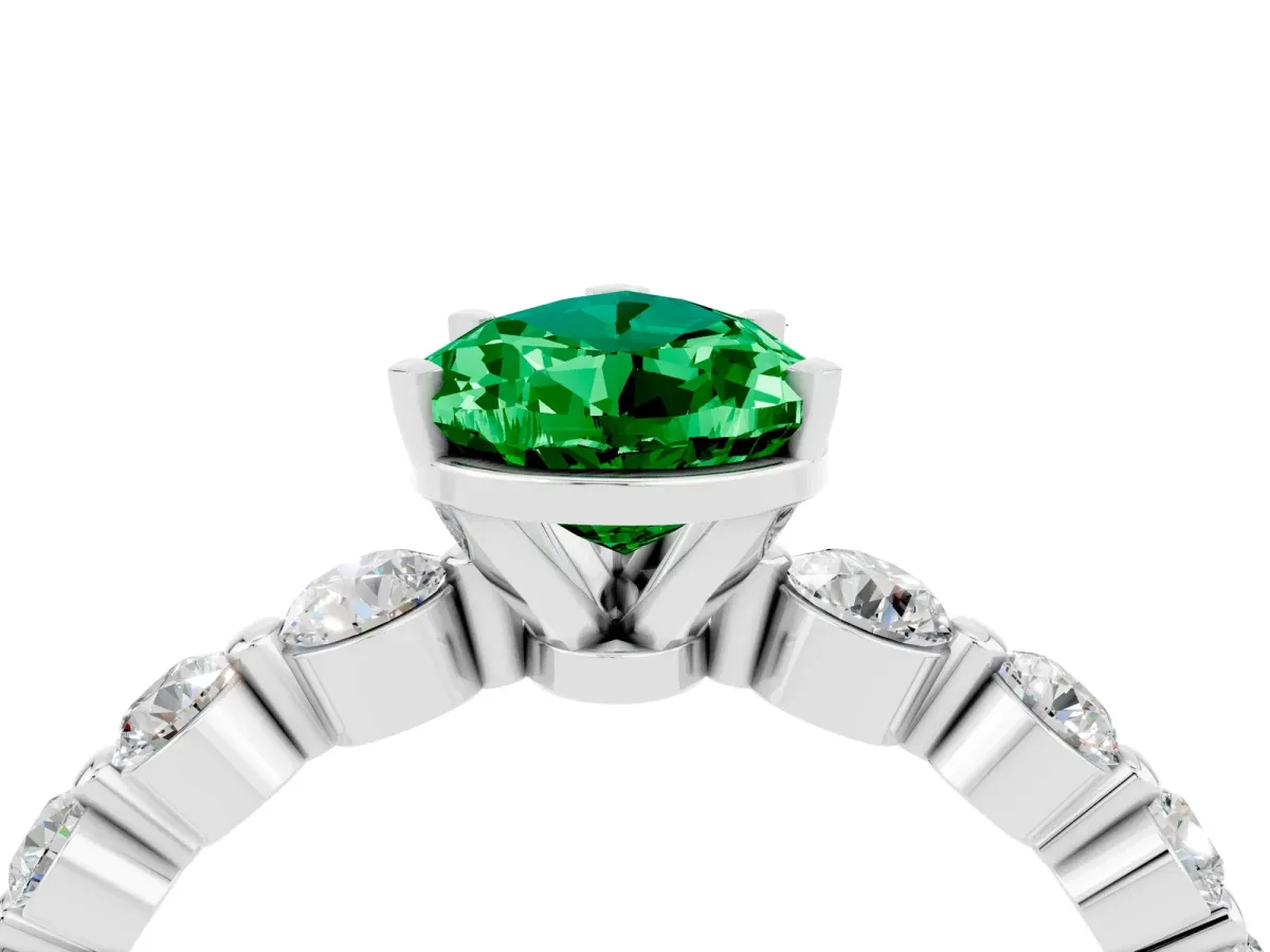 Pear Cut Solitaire Emerald Ring with Pave Band and Four-Prong Setting Silver