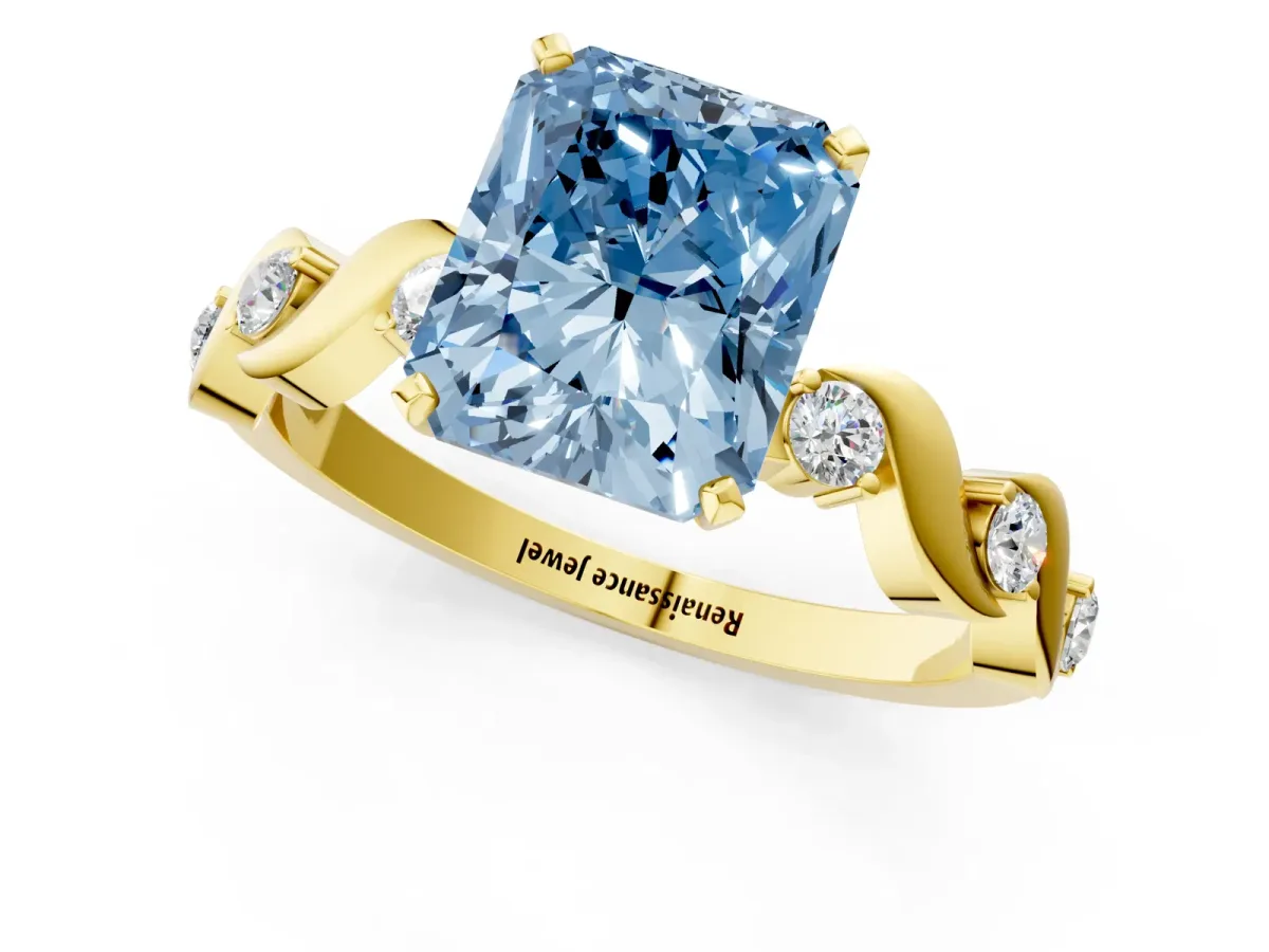 Fancy Blue Radiant Cut Diamond Solitaire Twisted Band with Round Accents and Prong Setting Yellow gold