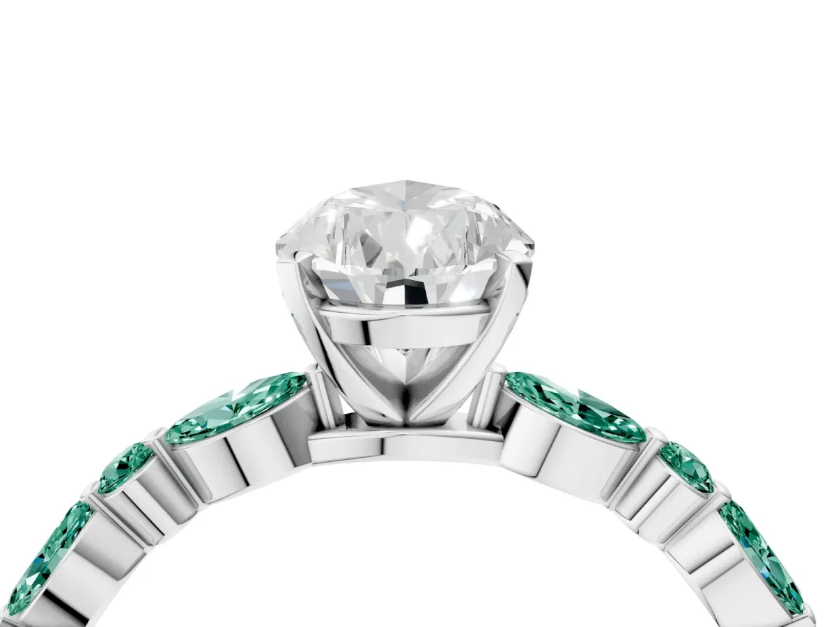 Pear Cut Diamond Ring with Marquise and Round Green Sapphire Side Stones and Four-Prong Setting White gold