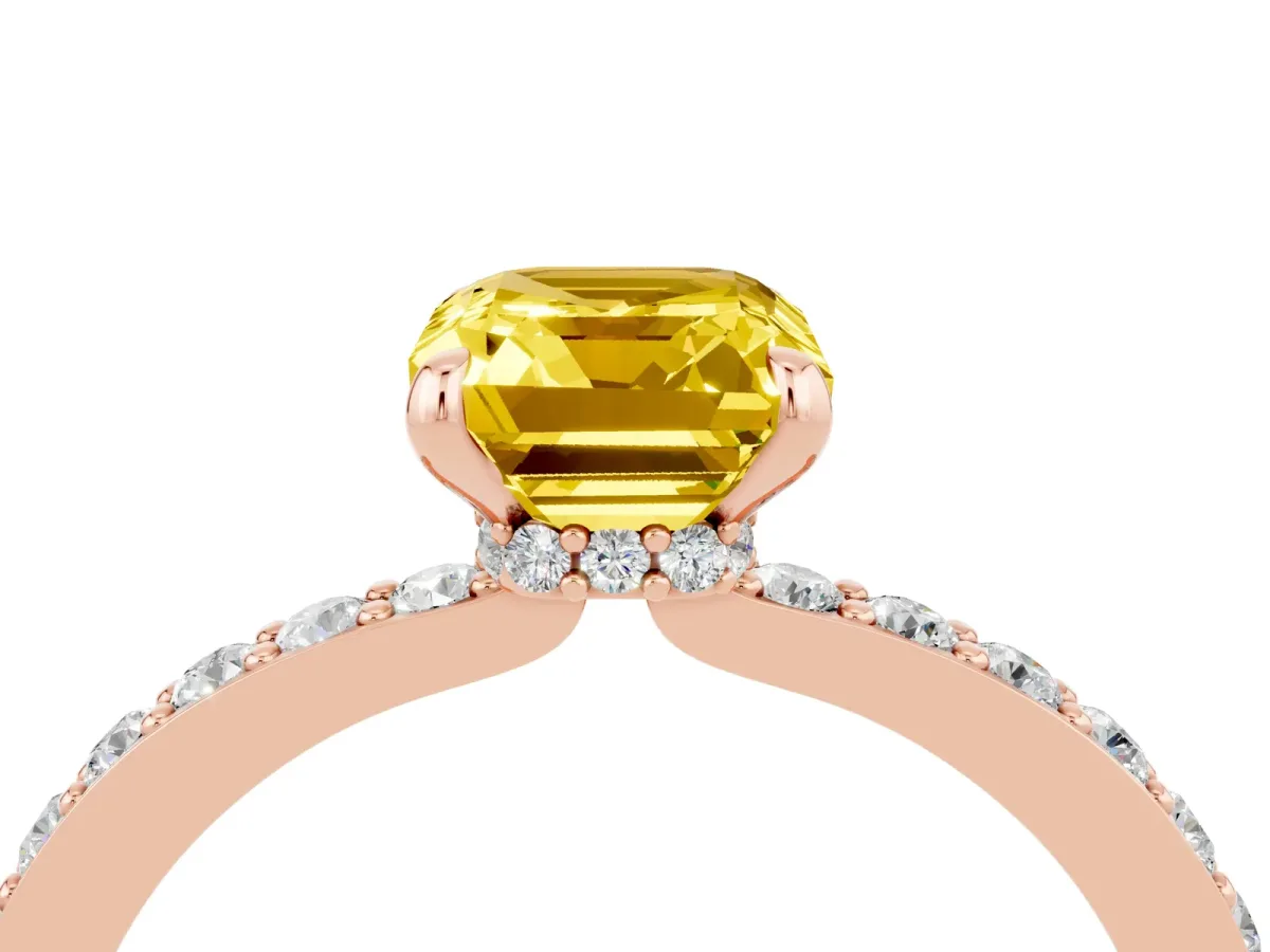 Emerald Cut Yellow Sapphire Solitaire Engagement Ring with Pavé Band and Four-Prong Setting Rose gold