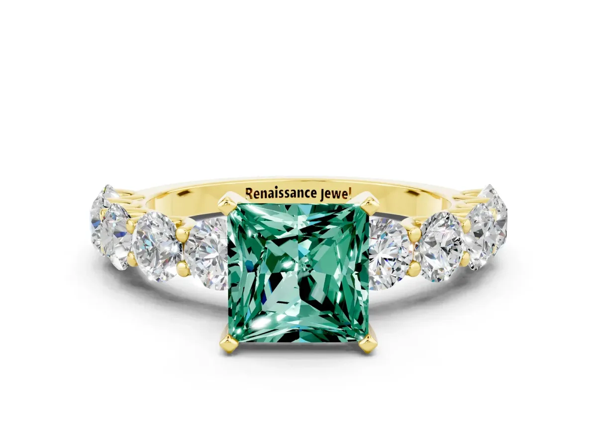 Princess Cut Green Sapphire Prong Setting with Side Stones on a Pave Band Yellow gold