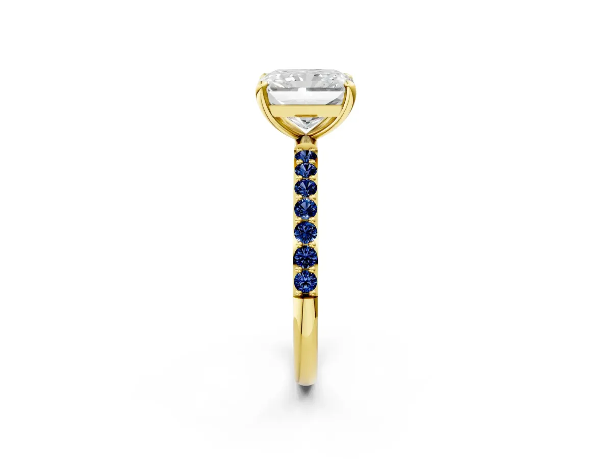 Radiant Cut Diamond Solitaire Ring with Round Blue Sapphire Pavé Band and Prong Setting Yellow gold