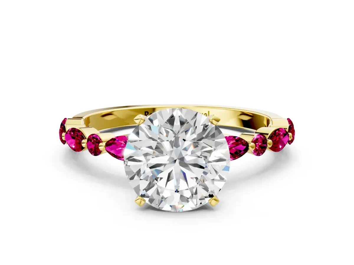 Round Cut Diamond Ring with Marquise and Round Garnet Side Stones and Four-Prong Setting Yellow gold