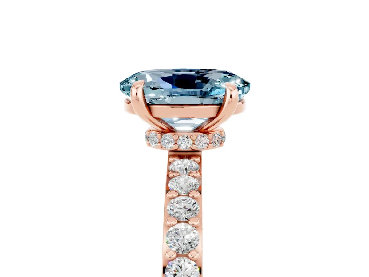 Oval Cut Aquamarine Solitaire Engagement Ring with Pavé Band and Four-Prong Setting Rose gold