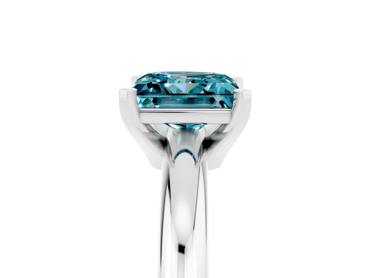 Princess Cut Blue Topaz Solitaire Engagement Ring with Round Band and Four-Prong Setting White gold