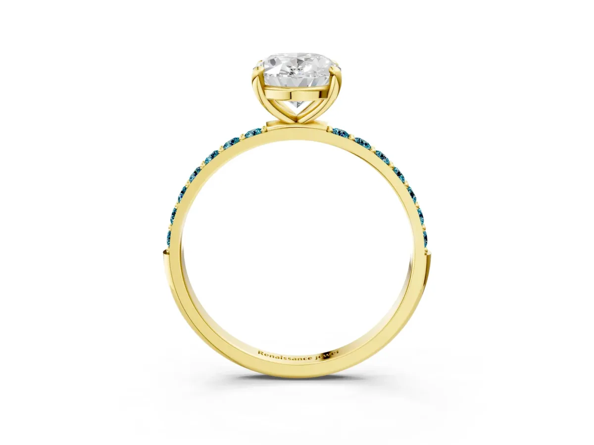 Oval Cut Diamond Solitaire Ring with Round Blue Topaz Pavé Band and Prong Setting Yellow gold