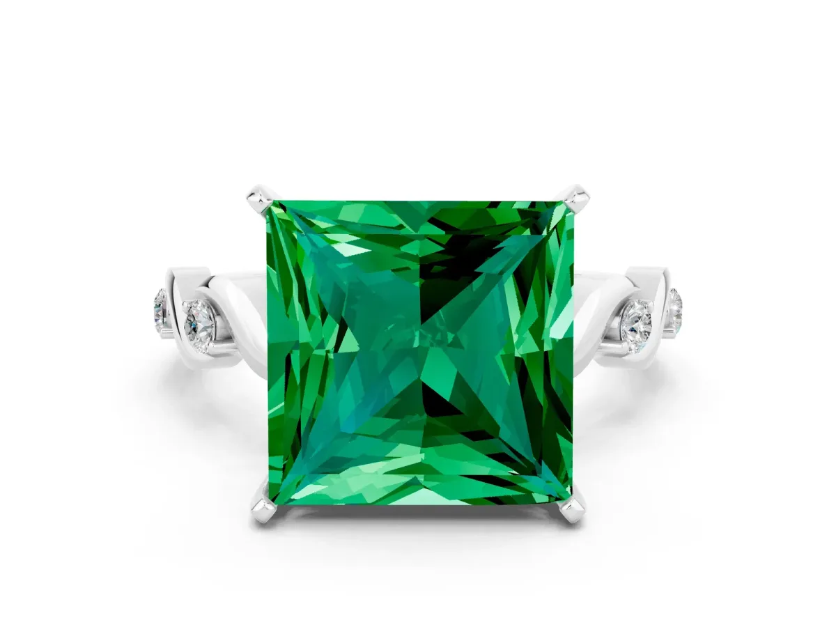 Princess Cut Emerald Solitaire Twisted Band with Round Accents and Prong Setting Silver