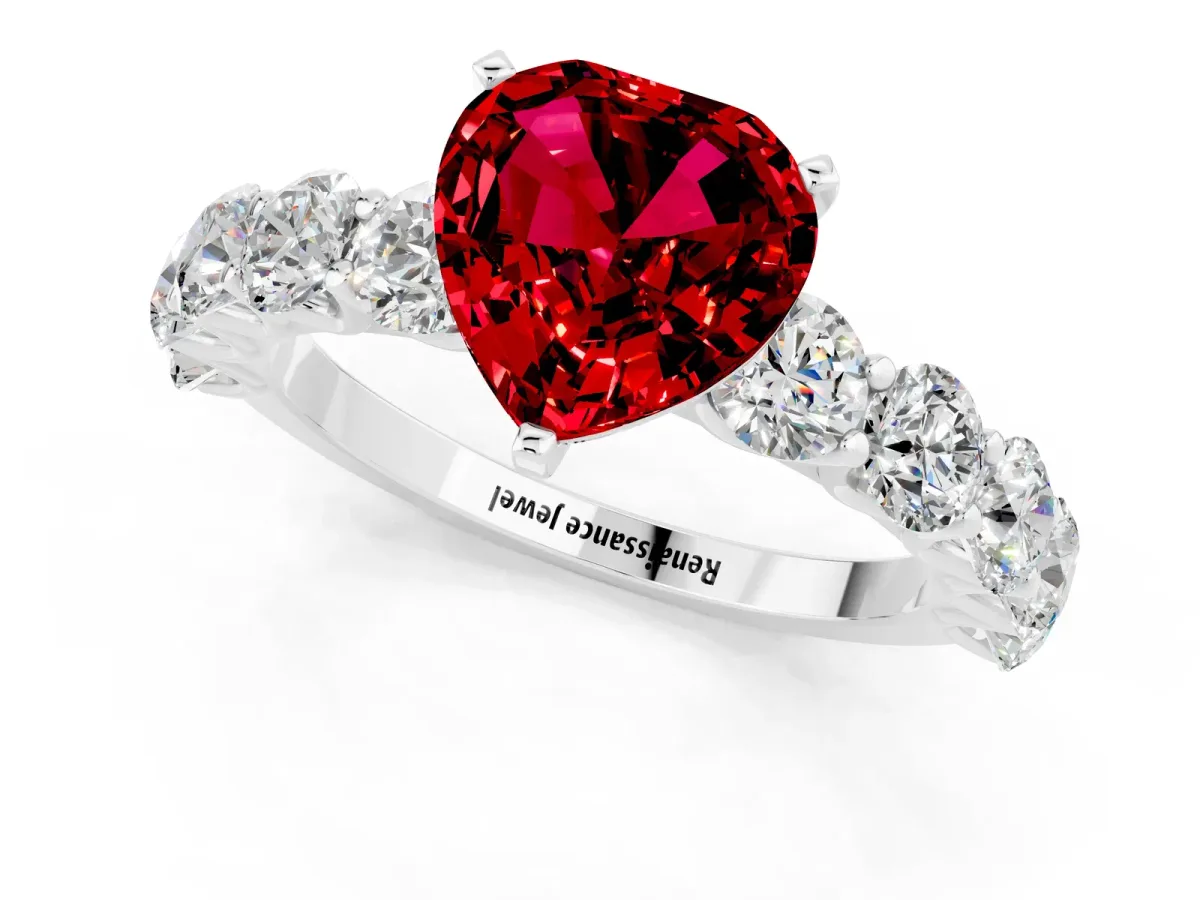 Heart Cut Ruby Prong Setting with Side Stones on a Pave Band Silver