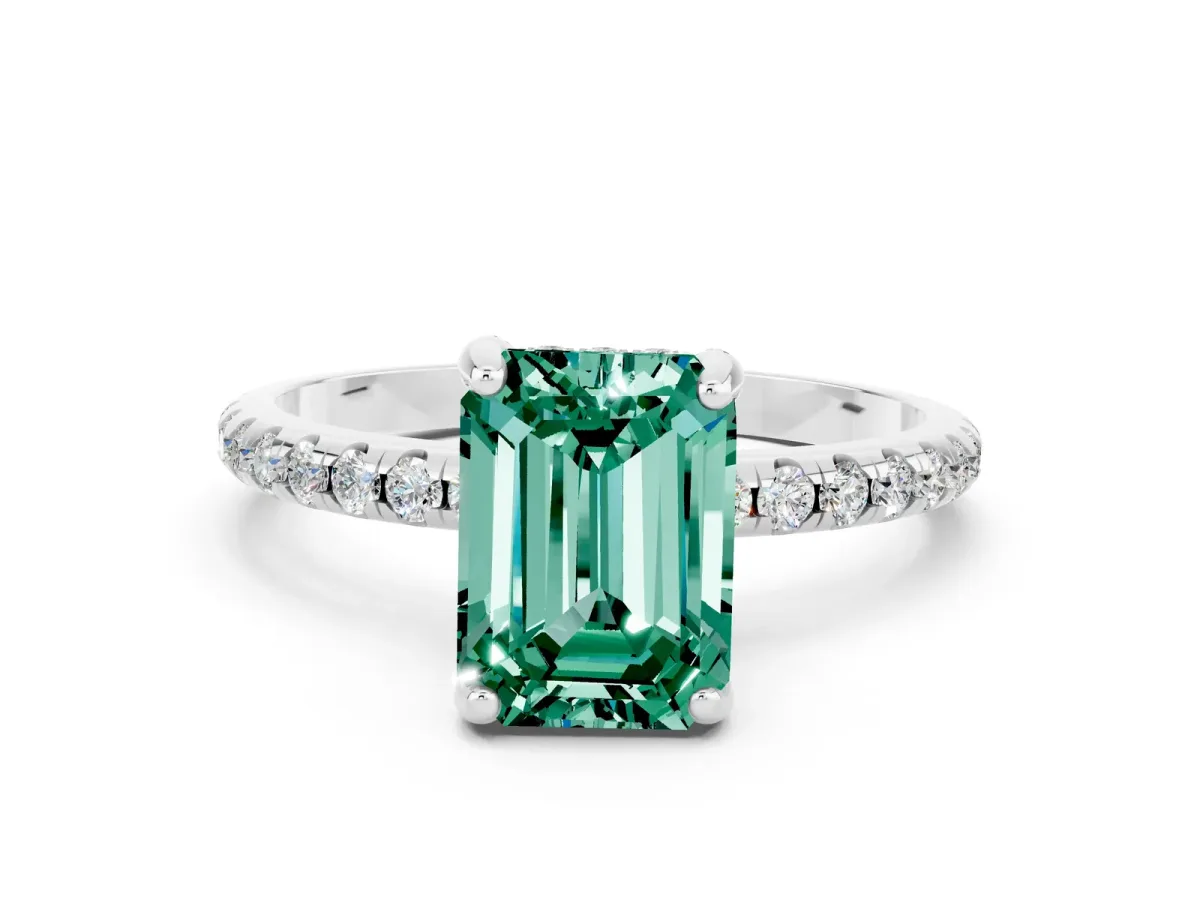 Emerald Cut Green Sapphire Hidden Halo Engagement Ring with Round Pavé Band and Prong Setting Silver
